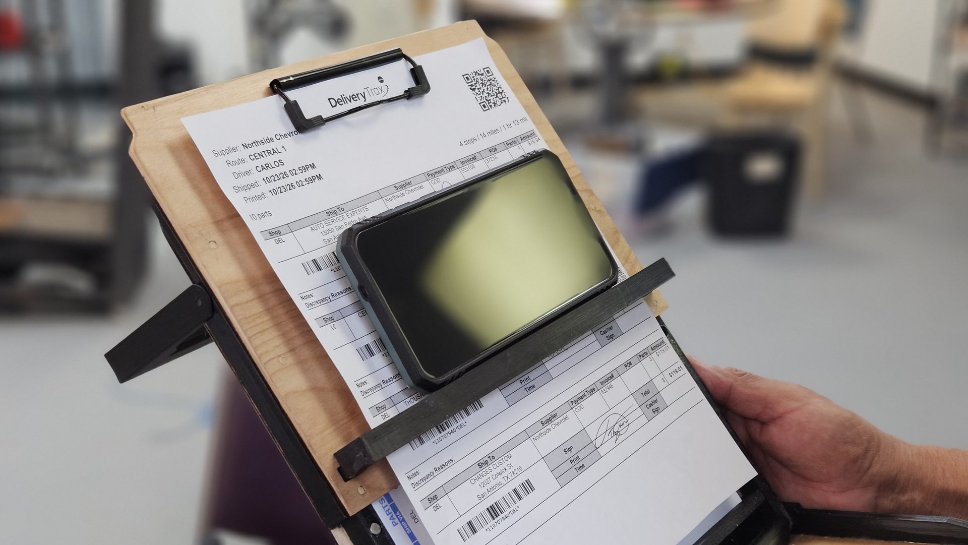 DeskDrive Pro birch clipboard with a phone held on the removable front bar